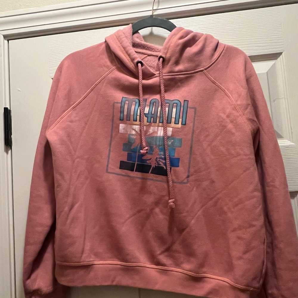 Woman’s Roxy Miami hoodie. Size large but runs small